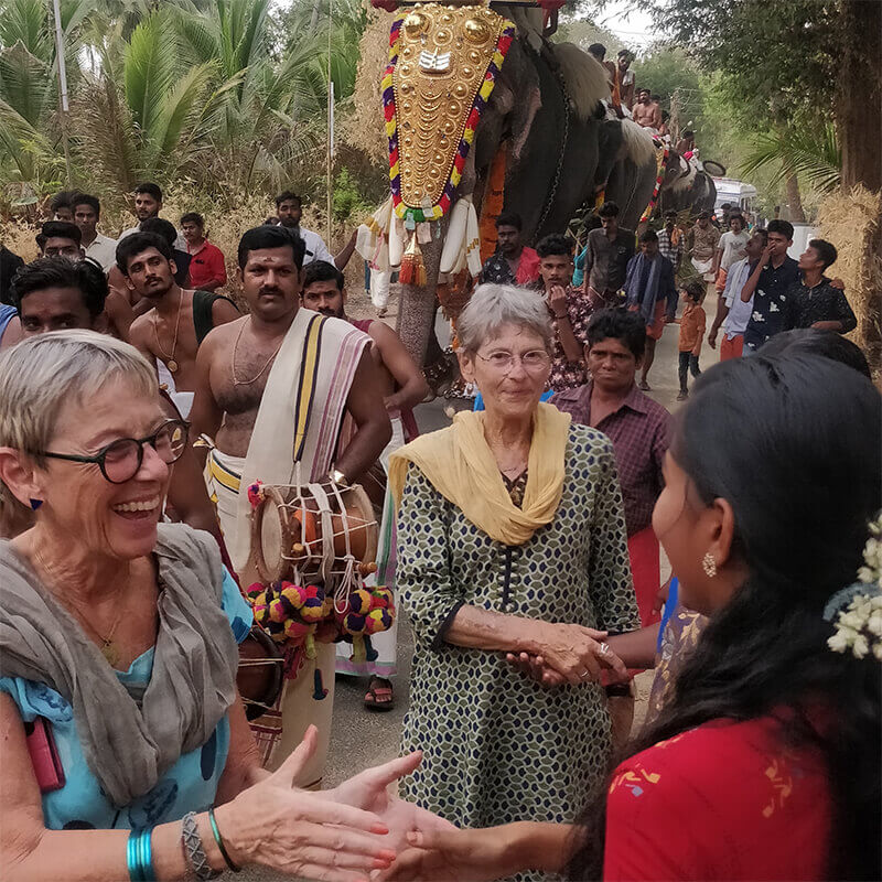 Our travelers interacting with the locals. A regular sight during tours of Moksha Stories