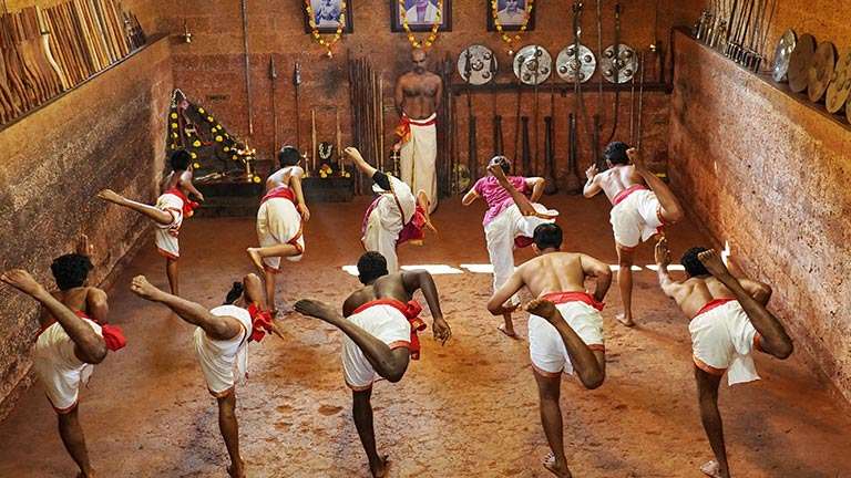 Students practicing Kalaraippayatu, an ancient martial art form of Kerala.