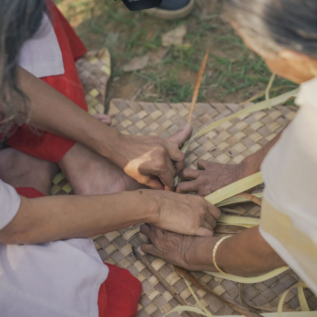 Palm leaf floor mat making