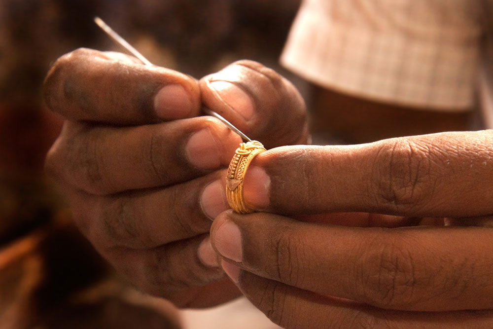 Craftsman making Payyannur pavithra mothiram. Payyannur Pavithra Mothiram is a kind of gold ring worn by Indians for its ritualistic value. Part of Moksha Stories Travel and tour experience in Kannur Payyannur