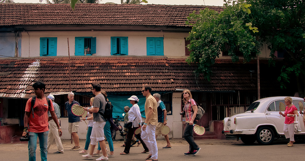 Travelers walking along the agraharams of Palakkad