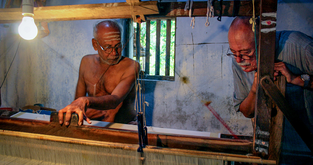 A traveler visiting a handloom worker in Palakkad